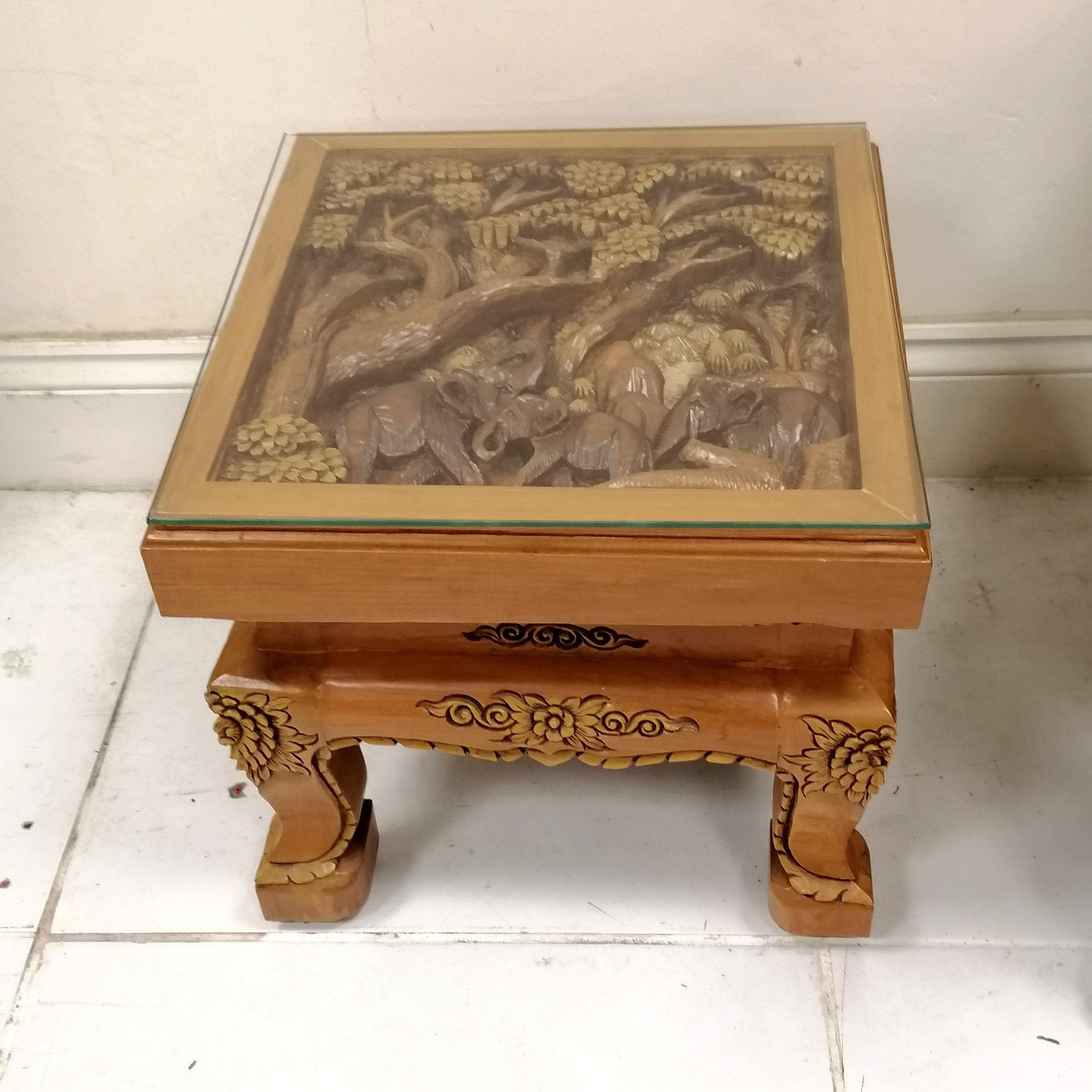 Indian heavily carved teak carver chair, decorated with elephants walking through a forest, 67 cm - Image 2 of 6
