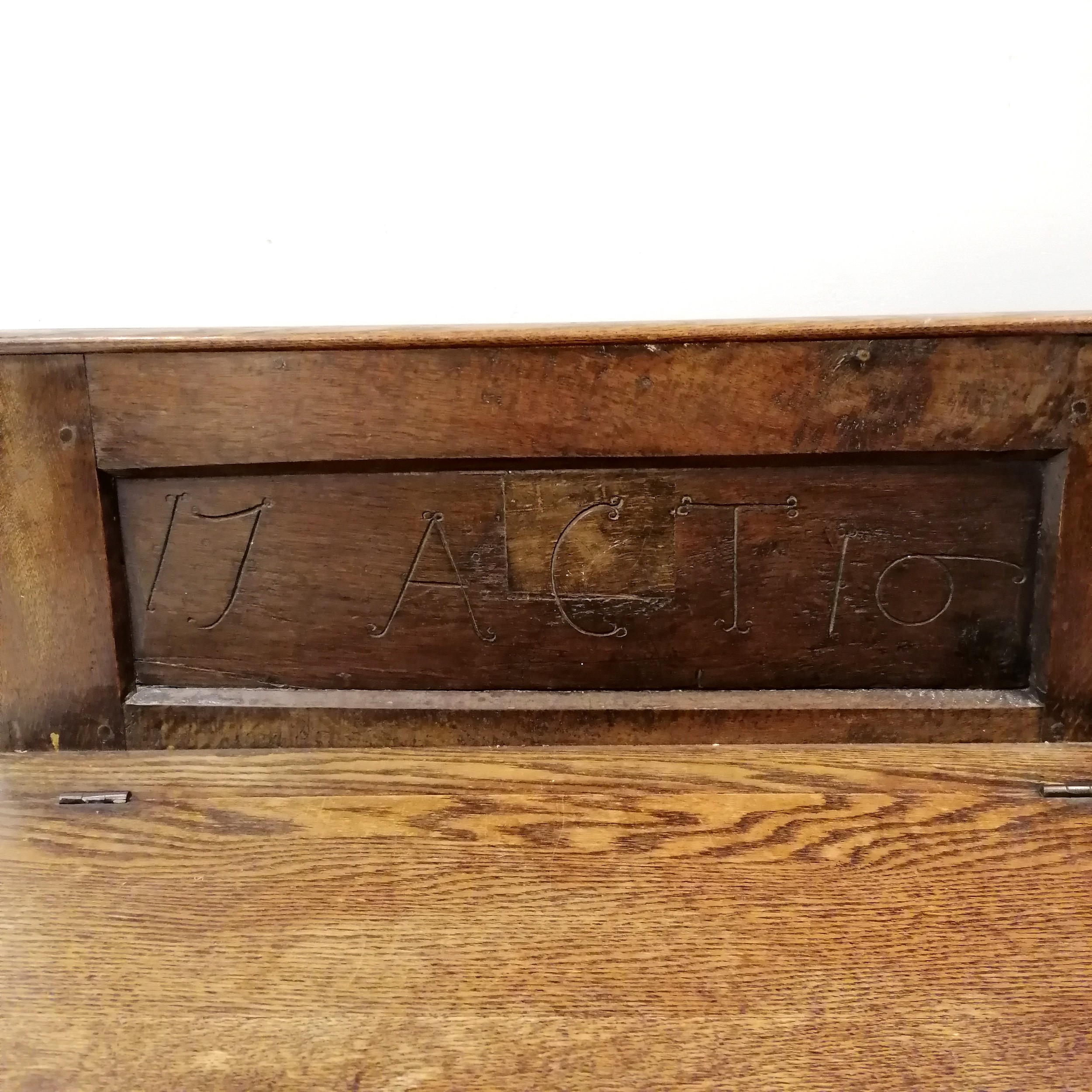 Antique oak hall seat dated and initialled 1710 ACT, possibly made from a coffer, 74 cm wide x 37 cm - Image 4 of 5
