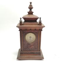 Black forest hand carved wooden clock with front panel decorated with deer & birds - 29cm high x