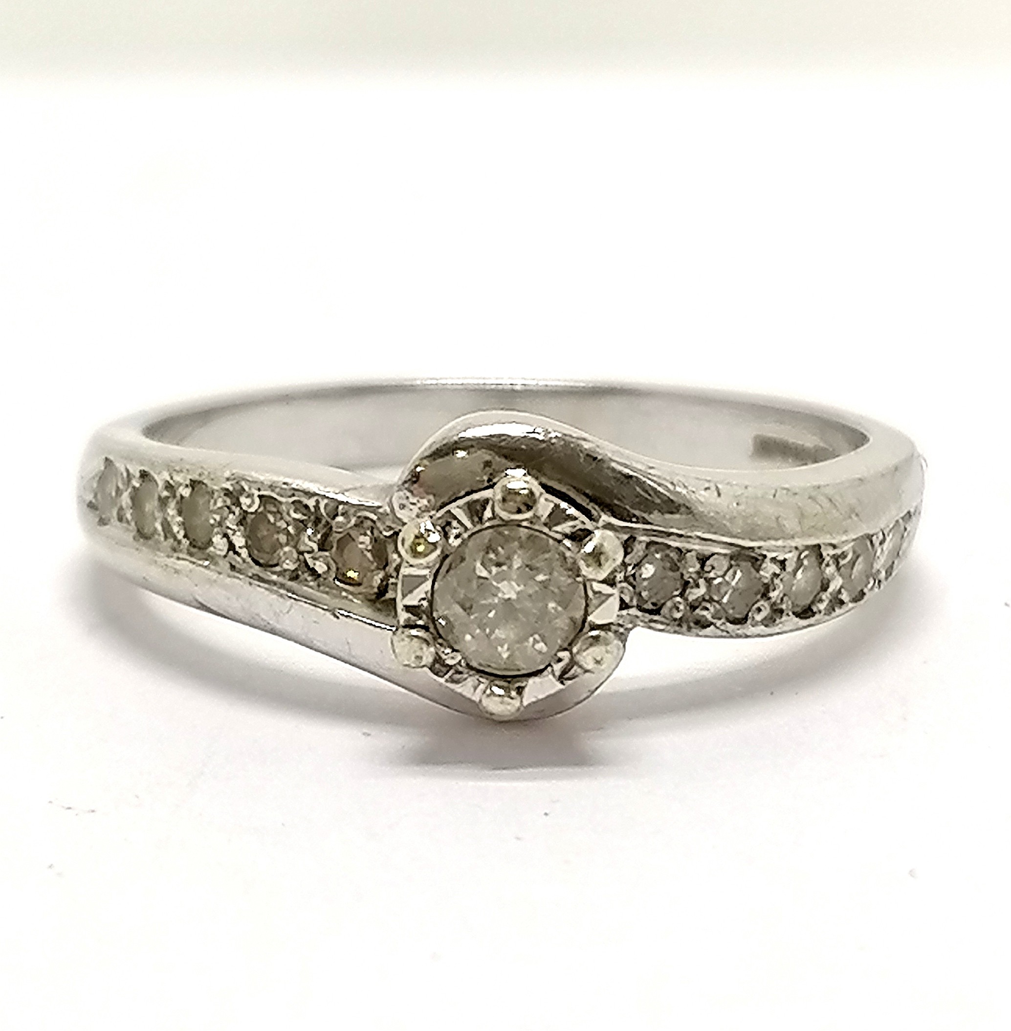 9ct hallmarked white gold solitaire diamond ring with diamond set crossover shoulders - size M & 2.