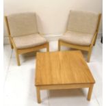 Pair of Blonde Elm Ercol easy chairs, with original oatmeal coloured upholstered cushions. in good