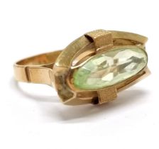 Foreign marked gold (touch tests as 18ct) ring set with green stone - size N½ & 4.7g total weight