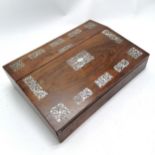 Antique rosewood veneered writing slope with profuse mother of pearl decoration to top & has