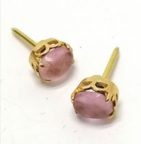 Pair of unmarked gold (touch tests as 18ct) amethyst set stud earrings - 2.2g total weight - SOLD ON