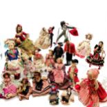 A vintage collection of 18 costume dolls the talest 36cm high including Nistis Spanish doll, Peggy