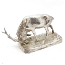 Antique silver plated figure of a charging stag, in good condition, 15 cm wide x 9 cm high.
