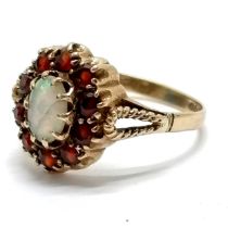 9ct hallmarked gold opal & garnet cluster ring - size R & 3.1g total weight ~ the opal has a crack