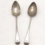 Pair of silver London 1803 tablespoons Maker WE- 22.5cm long and 127g - slight dents to one bowl.