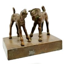 Art Deco study of 2 foals - 10.5cm across x 9cm high ~ 1 horse slightly loose and slight losses to