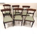 Set of William IV mahogany bow back dining chairs with drop in seats upholstered in a green