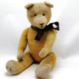 1926 large jointed teddy called Monty straw filled with glass eyes and stitched mouth and nose (