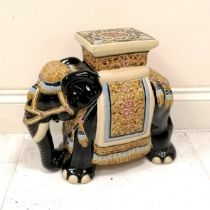 Oriental ceramic plant stand in the form of a black elephant, damage to 1 foot, but overall good