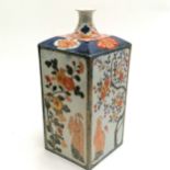 Antique Oriental squared vase with flared top and raised floral detail to panels - 25.5cm high ~