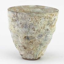 † AKI MORIUCHI (born 1947); a stoneware vessel with textured surface, impressed mark, height 15.5cm.
