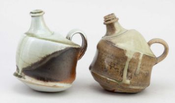 † BEN BRIERLEY (born 1964); a wood fired porcelain pouring vessel partially covered in celadon