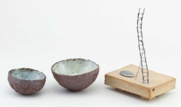 AKIKO HIRAI (born 1970); two miniature stoneware pond bowls with lime green glaze pooling to the