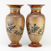 FLORENCE BARLOW for DOULTON LAMBETH; a pair of stoneware vases with flared necks decorated with