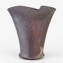 AKIHIKO KISHIMOTO; a wood fired stoneware axe shaped form, impressed mark, height 21cm.