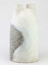 † ALEX HAGEN; a tall double necked stoneware vessel partially covered in white glaze with incised