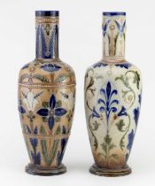 BAILEY, FULHAM; two similar stoneware vases with embossed and relief floral decoration with blue and