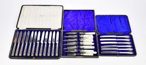 A cased set of silver plated pickle forks with knives, each with mother of pearl handle, cased set