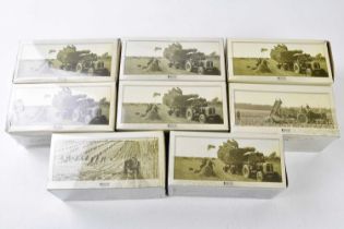 ATLAS COLLECTIONS; a group of eight boxed tractors.