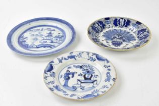 DELFT; two 18th century tin glazed plates to include an example in the Oriental manner with a figure