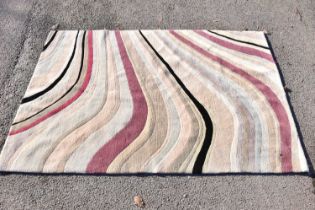 PAUL SMITH; a contemporary rug with linear decoration, 184 x 125cm.