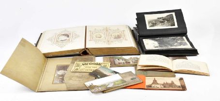 A Victorian photograph album containing family photographs, a further photograph album containing