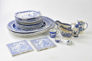 A collection of 19th century and later blue and white ironstone including meat plates, various other