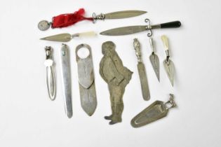 A collection of hallmarked silver and white metal bookmarks including an example modelled as a sword