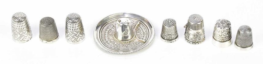 MAPPIN AND WEBB; a pair of Elizabeth II hallmarked silver thimbles, stamped London 1981, together