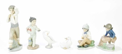 NAO; a group of four figures to include duck, seated boy, seated girl and young boy and dog,
