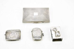 FREDERICK FIELD LTD; a George V hallmarked silver cigarette case, Birmingham 1931, together with two