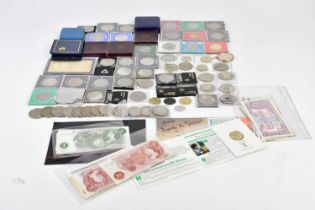 A collection of predominantly British coins and bank notes including commemorative crowns, Battle of