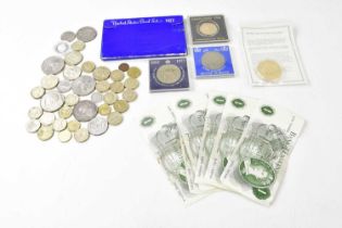 A collection of assorted Victorian and later coins, including a US 1921 one dollar, commemorative