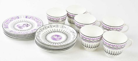 AFTER EDWARD BAWDEN FOR WEDGWOOD; a nineteen piece part tea service with floral and stylised