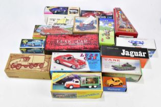 A large collection of modern diecast and clockwork/tinplate vehicles and models including