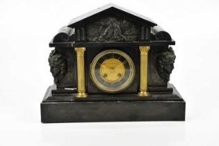 A Victorian slate mantel clock of architectural form with applied plaque of a maiden beside bull and