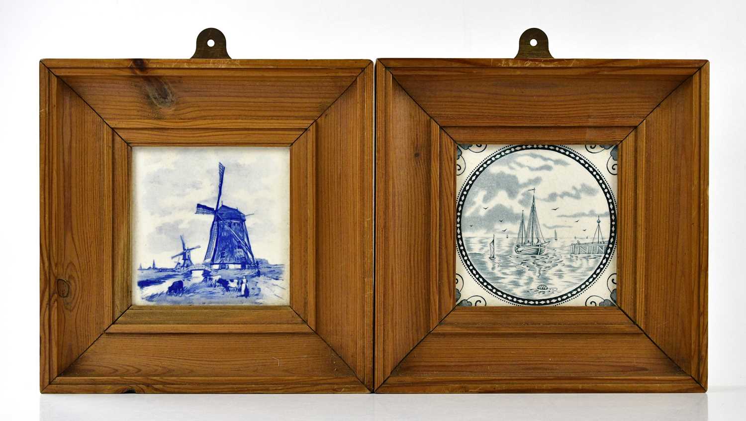 Two Victorian transfer printed tiles, including a Delft style example, 13 x 13cm, each in pine