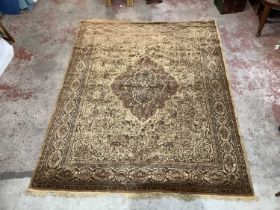 A gold ground eastern style carpet, 352 x 274cm