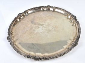 A large white metal salver stamped 'Verdi', possibly Lebanese, diameter 40cm.