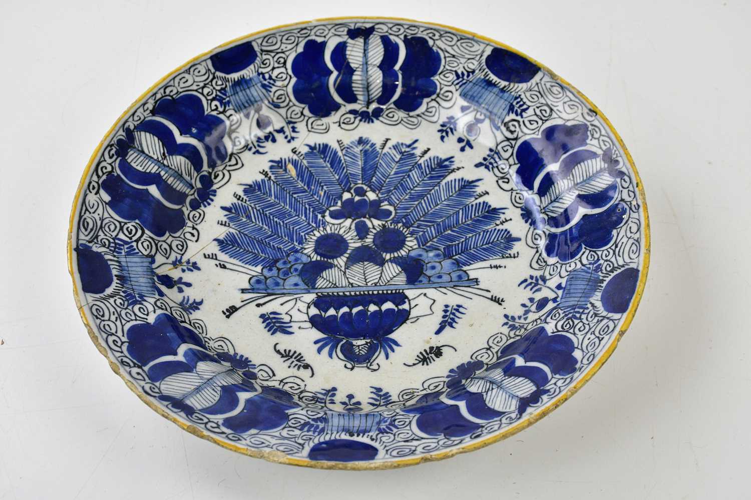 DELFT; two 18th century tin glazed plates to include an example in the Oriental manner with a figure - Image 3 of 12