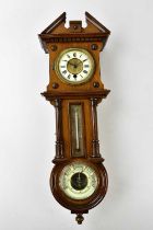 A Victorian walnut cased wall clock, thermometer and barometer, with white enamel dial set with