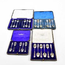 JOSEPH RODGERS & SONS; a cased set of six George V hallmarked silver teaspoons and matching sugar