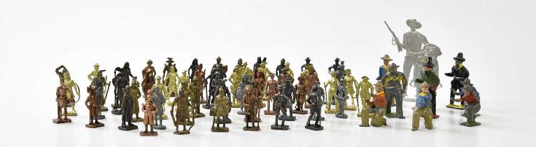 A small group of vintage c1950s metal and tin cowboys and soldiers including Britains and Scame