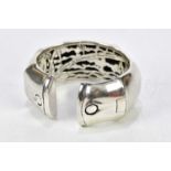 JOHN HARDY; a sterling silver bamboo effect bangle, approximate weight 133g, boxed