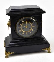 A late Victorian eight day black slate mantel clock, with Roman numeral chapter ring, height 32cm, a