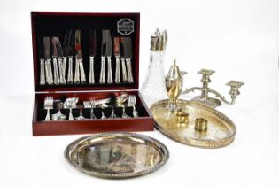 A small quantity of assorted silver plate including a table canteen, candelabrum etc.