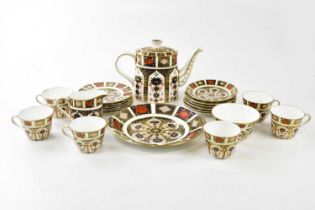 ROYAL CROWN DERBY; a twenty-two piece tea service in the 1128 pattern. Condition Report: Light